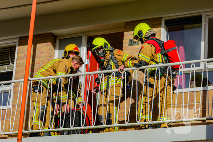 Brand in keuken in flatwoning snel onder controle