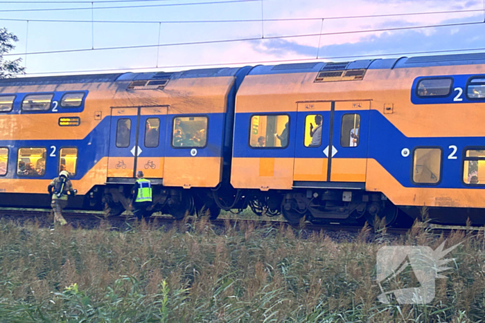 Rookontwikkeling onder trein door vastgelopen remmen