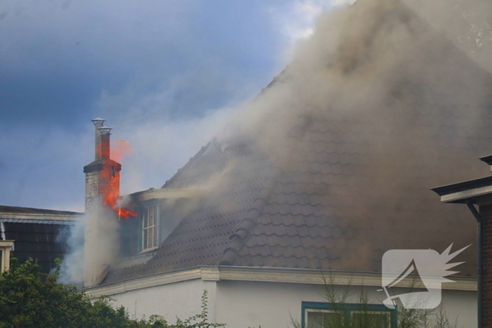 Grote rookontwikkeling bij woningbrand