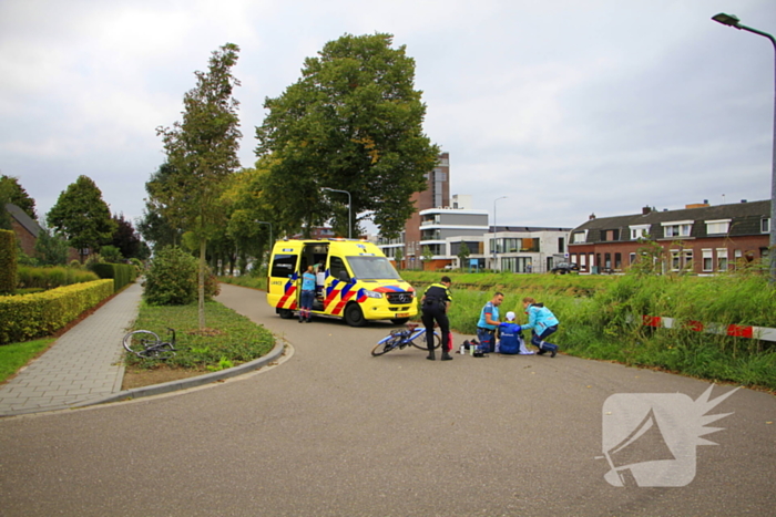 Wielrenner en fietser botsen op elkaar