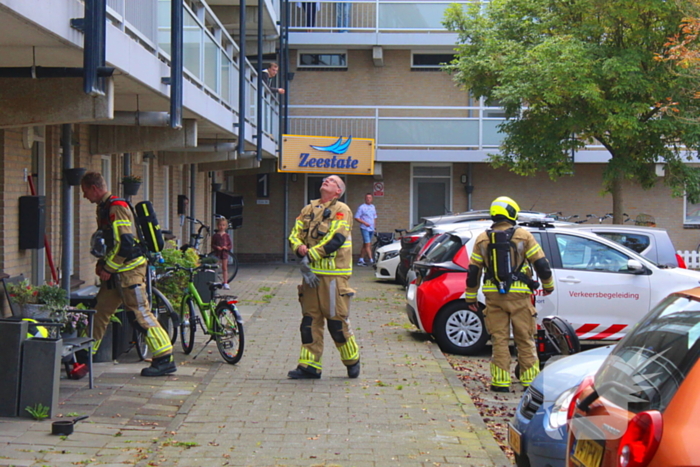 Raam ingeslagen voor pan op het vuur