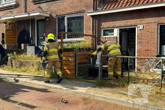 Brand in woonkamer snel onder controle