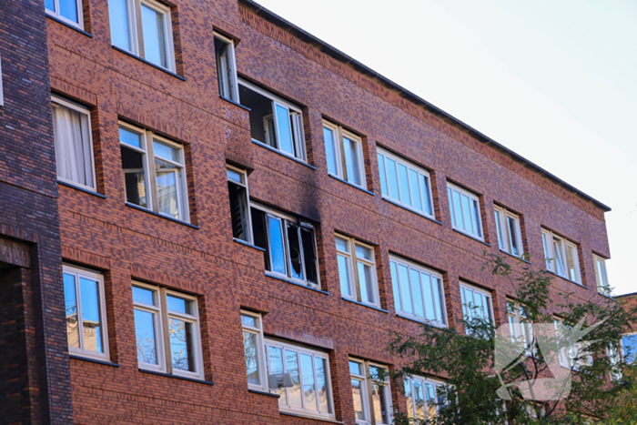 Uitslaande brand in flatwoning