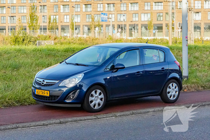 Scooterrijder en automobilist in botsing