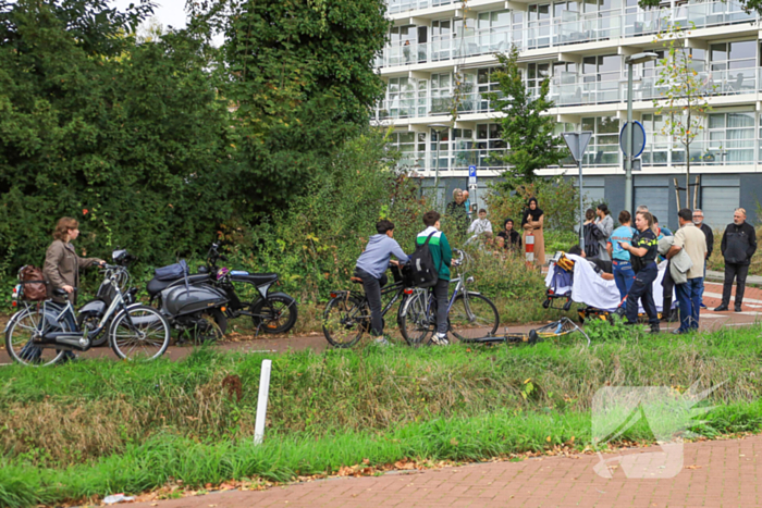 Gewonde bij aanrijding tussen scooter en fietser