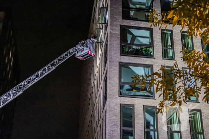 Brand in woning bij appartementencomplex