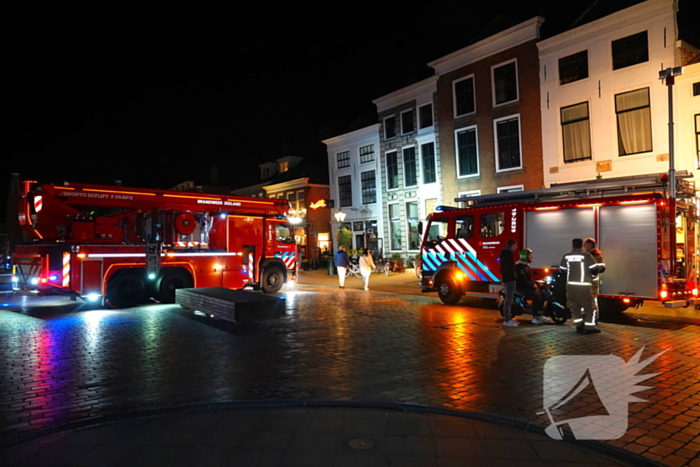 Brand in winkelpand snel onder controle