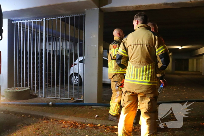 Woningen ontruimd door brand in parkeergarage