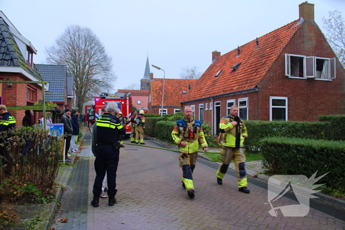 Flinke rookontwikkeling bij middelbrand in woning