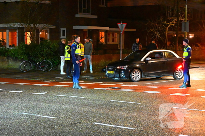 Scooterrijder en automobilist met elkaar in botsing