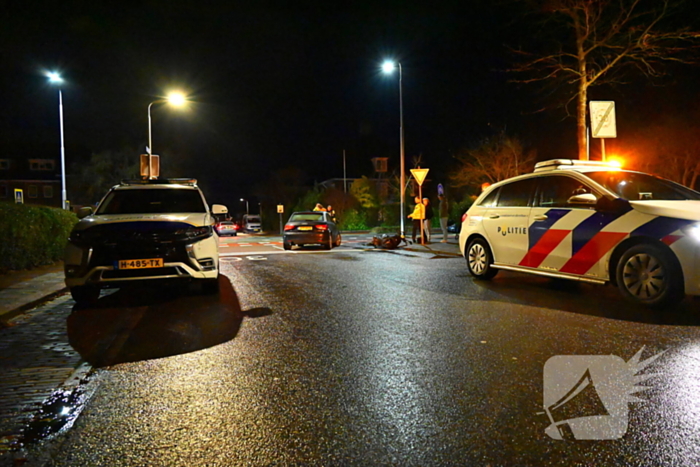 Scooterrijder en automobilist met elkaar in botsing