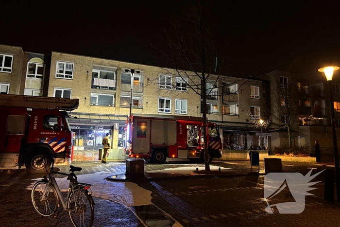 Brandweer blust brand in appartement