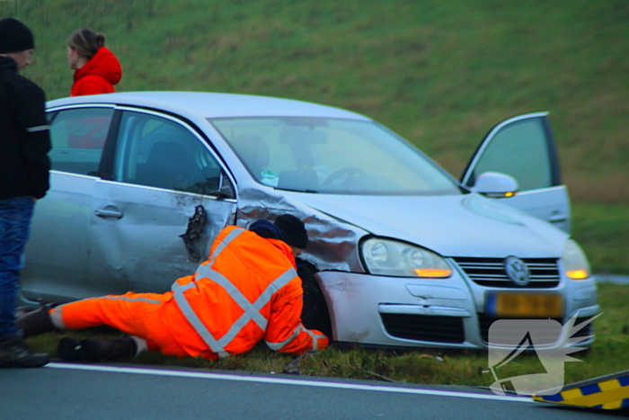 File na aanrijding tussen twee voertuigen