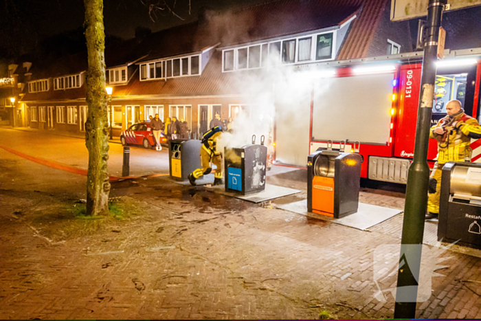 Brandweer laat ondergrondse container vollopen