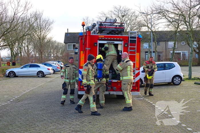 Veel rookontwikkeling bij brand in papiercontainer