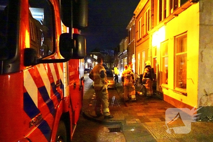 Brandalarm in woning, brandweer forceert deur