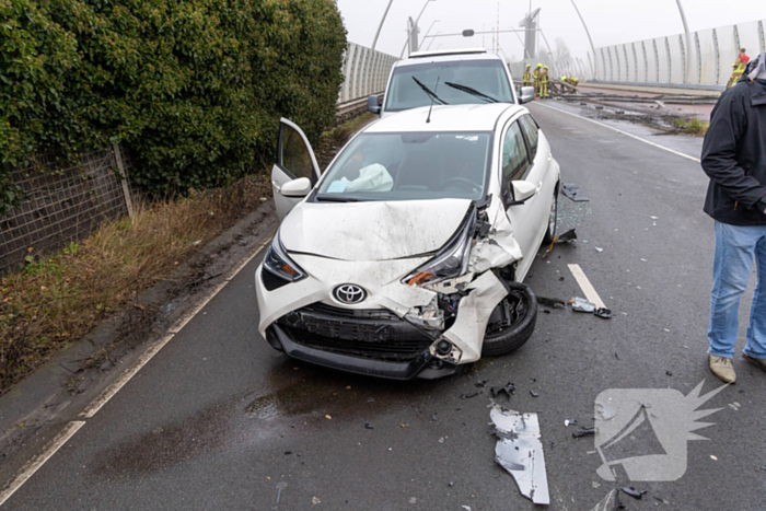 Forse schade na botsing met vrachtwagen