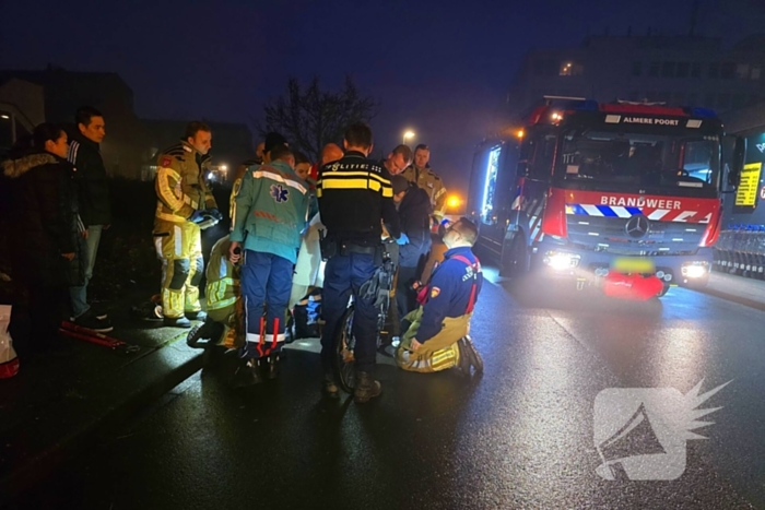 Kindje vast met voet tussen spaken